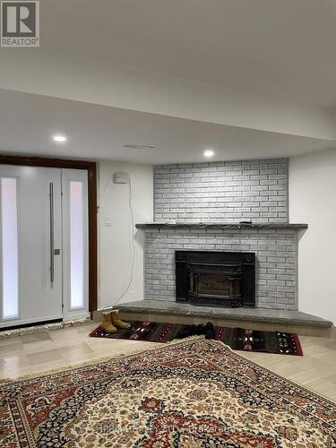 Bsmt - 19 St. Andrews Boulevard, Toronto, ON - Indoor Photo Showing Other Room With Fireplace