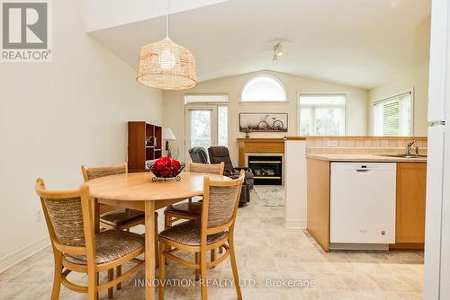 8 Nighthawk Crescent, Ottawa, ON - Indoor Photo Showing Dining Room With Fireplace