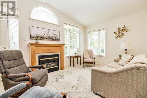 8 Nighthawk Crescent, Ottawa, ON - Indoor Photo Showing Living Room With Fireplace