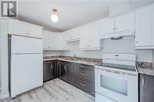 85 - 360 Scottsdale Drive, Guelph (Hanlon Creek), ON - Indoor Photo Showing Kitchen With Double Sink