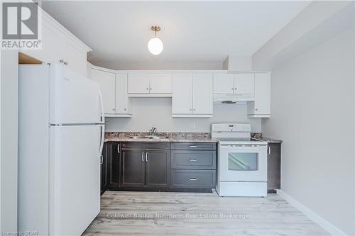 85 - 360 Scottsdale Drive, Guelph (Hanlon Creek), ON - Indoor Photo Showing Kitchen With Double Sink