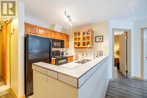 4559 Timberline Crescent Unit# 128, Fernie, BC - Indoor Photo Showing Kitchen With Double Sink