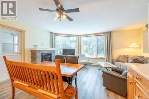 4559 Timberline Crescent Unit# 128, Fernie, BC - Indoor Photo Showing Living Room With Fireplace