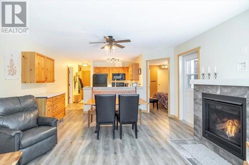 4559 Timberline Crescent Unit# 128, Fernie, BC - Indoor Photo Showing Living Room With Fireplace