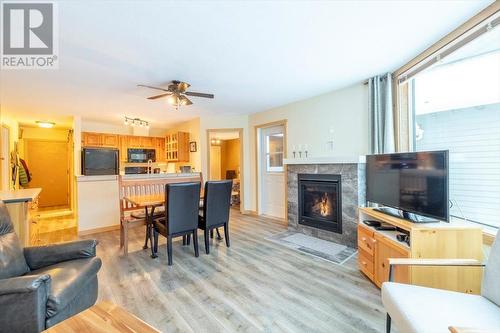 4559 Timberline Crescent Unit# 128, Fernie, BC - Indoor Photo Showing Living Room With Fireplace