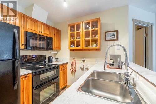 4559 Timberline Crescent Unit# 128, Fernie, BC - Indoor Photo Showing Kitchen With Double Sink