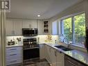 2 - 18 Ewing Street, Halton Hills, ON  - Indoor Photo Showing Kitchen With Double Sink 