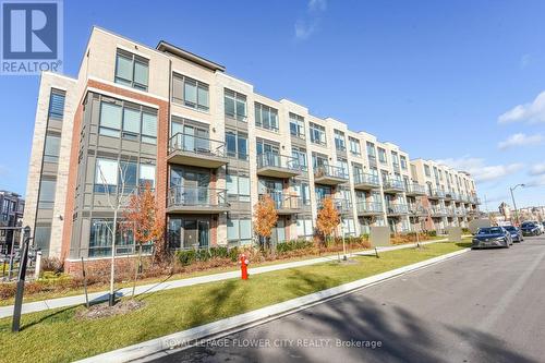 205 - 95 Attmar Drive, Brampton, ON - Outdoor With Balcony With Facade