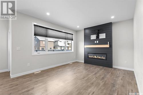 131 Barrett Street, Saskatoon, SK - Indoor Photo Showing Living Room With Fireplace