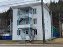 Overall view - 1145  - 1155 Boul. De Comporté, La Malbaie, QC  - Outdoor With Facade 