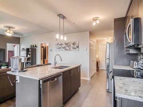 Kitchen - 501-1095 Rue Yves-Blais, Terrebonne (Lachenaie), QC - Indoor Photo Showing Kitchen With Double Sink