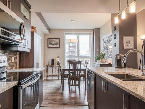 Kitchen - 501-1095 Rue Yves-Blais, Terrebonne (Lachenaie), QC - Indoor Photo Showing Kitchen With Double Sink With Upgraded Kitchen