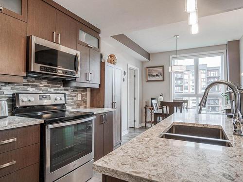 Kitchen - 501-1095 Rue Yves-Blais, Terrebonne (Lachenaie), QC - Indoor Photo Showing Kitchen With Double Sink With Upgraded Kitchen