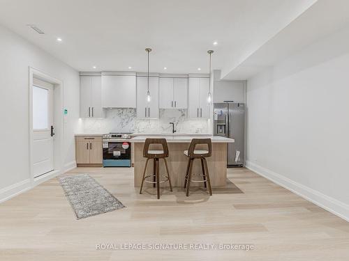 Lower-26 Norlong Blvd, Toronto, ON - Indoor Photo Showing Kitchen With Upgraded Kitchen