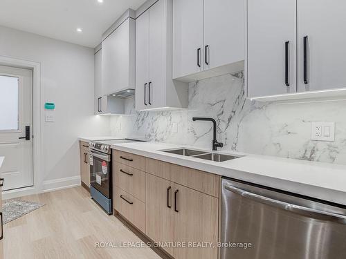 Lower-26 Norlong Blvd, Toronto, ON - Indoor Photo Showing Kitchen With Double Sink With Upgraded Kitchen