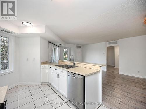 204 - 2301 Parkhaven Boulevard, Oakville (Uptown Core), ON - Indoor Photo Showing Kitchen With Double Sink