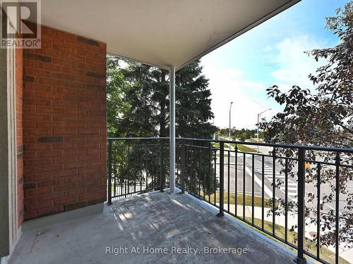 204 - 2301 Parkhaven Boulevard, Oakville (Uptown Core), ON - Outdoor With Balcony With Exterior