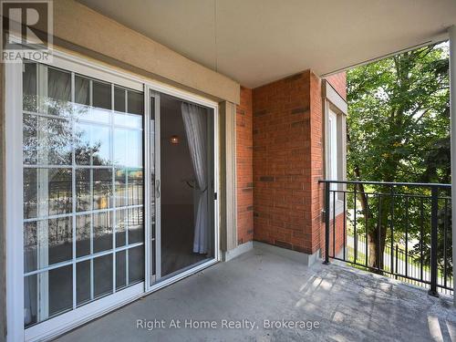 204 - 2301 Parkhaven Boulevard, Oakville (Uptown Core), ON - Outdoor With Balcony With Exterior