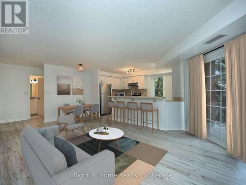 204 - 2301 Parkhaven Boulevard, Oakville (Uptown Core), ON - Indoor Photo Showing Living Room