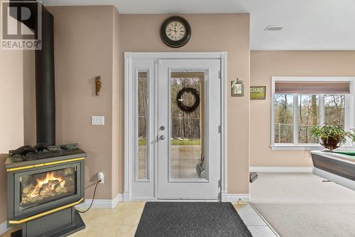 Rec room downstairs - 801 20 Street Ne Unit# 31 Lot# 31, Salmon Arm, BC - Indoor With Fireplace