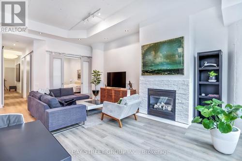 412 - 155 Dalhousie Street, Toronto, ON - Indoor Photo Showing Living Room With Fireplace