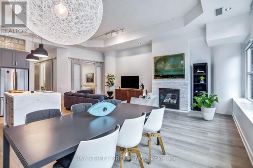 412 - 155 Dalhousie Street, Toronto, ON - Indoor Photo Showing Dining Room With Fireplace