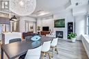 412 - 155 Dalhousie Street, Toronto, ON  - Indoor Photo Showing Dining Room With Fireplace 