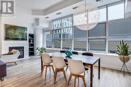 412 - 155 Dalhousie Street, Toronto, ON - Indoor Photo Showing Dining Room With Fireplace