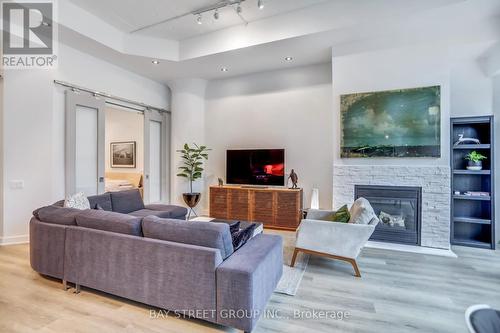 412 - 155 Dalhousie Street, Toronto, ON - Indoor Photo Showing Living Room With Fireplace