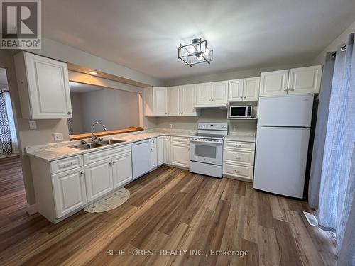 231 Wellington Street, West Perth (65 - Town Of Mitchell), ON - Indoor Photo Showing Kitchen With Double Sink