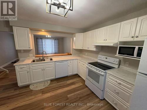 231 Wellington Street, West Perth (65 - Town Of Mitchell), ON - Indoor Photo Showing Kitchen With Double Sink