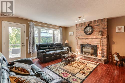 1 Meadowbrook Lane, Thames Centre (Thorndale), ON - Indoor Photo Showing Living Room With Fireplace