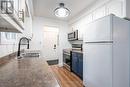 4 Mcnicholl Circle, St. Catharines (446 - Fairview), ON  - Indoor Photo Showing Kitchen With Double Sink 