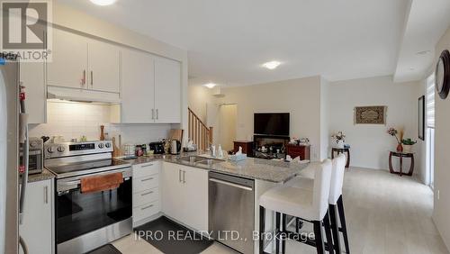 89 - 25 Knotsberry Circle, Brampton, ON - Indoor Photo Showing Kitchen With Double Sink