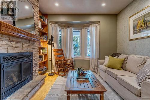 82 Marion Street, Toronto, ON - Indoor Photo Showing Living Room With Fireplace