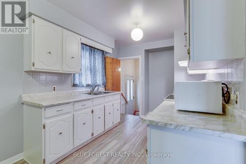 68 Mcnay Street, London, ON - Indoor Photo Showing Kitchen With Double Sink