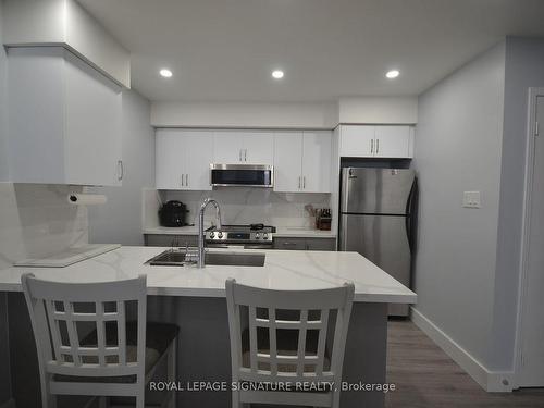 161-4975 Southampton Dr, Mississauga, ON - Indoor Photo Showing Kitchen With Double Sink