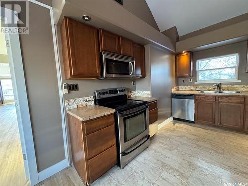 222 1St Street, Lang, SK - Indoor Photo Showing Kitchen With Double Sink