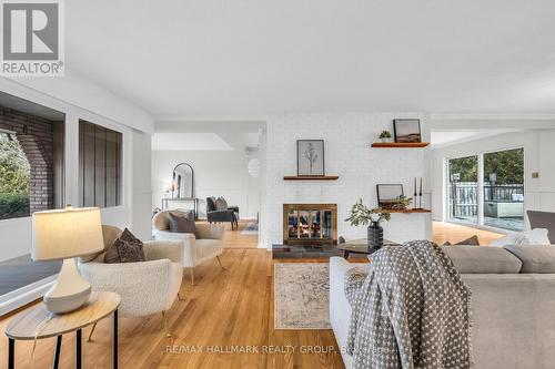 35 Bedale Drive, Ottawa, ON - Indoor Photo Showing Living Room With Fireplace