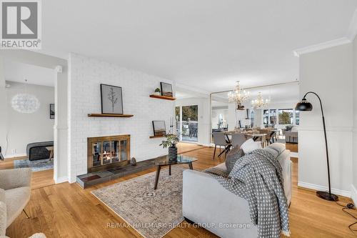 35 Bedale Drive, Ottawa, ON - Indoor Photo Showing Living Room With Fireplace