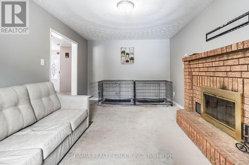 1 Glenayr Gate, Whitby, ON - Indoor Photo Showing Living Room With Fireplace