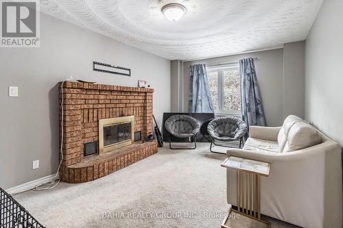 1 Glenayr Gate, Whitby, ON - Indoor Photo Showing Living Room With Fireplace