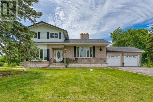 3715 Unity Rd Road, Kingston (City North Of 401), ON - Outdoor With Deck Patio Veranda With Facade