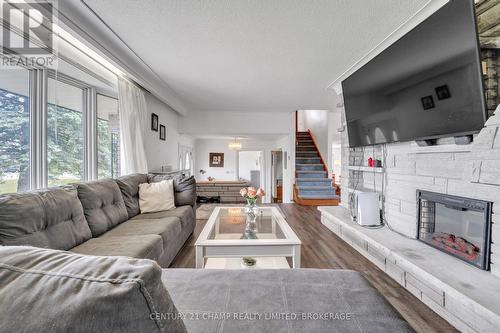 3715 Unity Rd Road, Kingston (City North Of 401), ON - Indoor Photo Showing Living Room With Fireplace