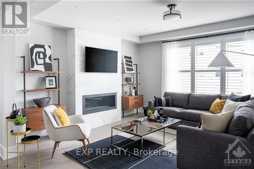 153 Robert Perry Street, North Grenville, ON - Indoor Photo Showing Living Room With Fireplace