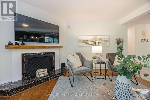 71 Kingsford Crescent, London, ON - Indoor Photo Showing Living Room With Fireplace