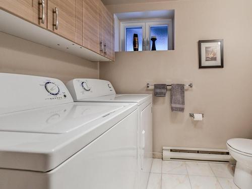 Salle de bains - 44 Place Berlioz, Candiac, QC - Indoor Photo Showing Laundry Room