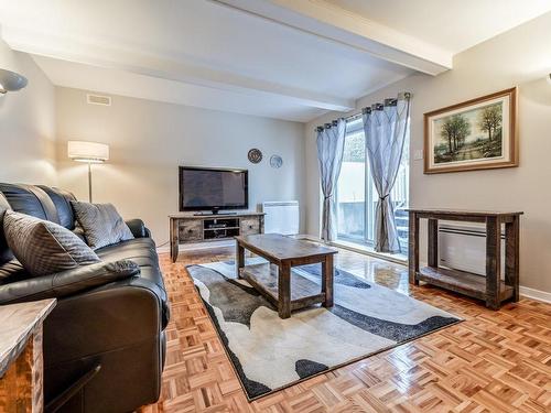 Salle Ã  manger - 44 Place Berlioz, Candiac, QC - Indoor Photo Showing Living Room With Fireplace