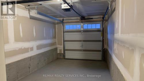 19 - 45 Fieldridge Crescent, Brampton, ON - Indoor Photo Showing Garage