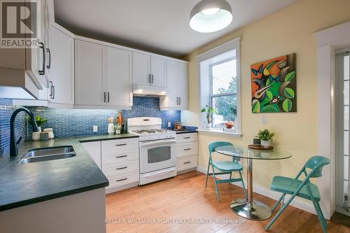 130 Sunnyside Avenue, Toronto, ON - Indoor Photo Showing Kitchen With Double Sink